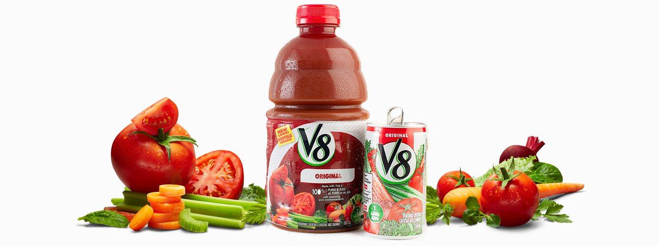 V8 can and bottle beside vegetables