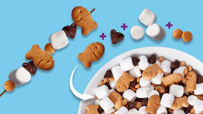 Goldfish® Snack S'more on stick and in a bowl on blue background