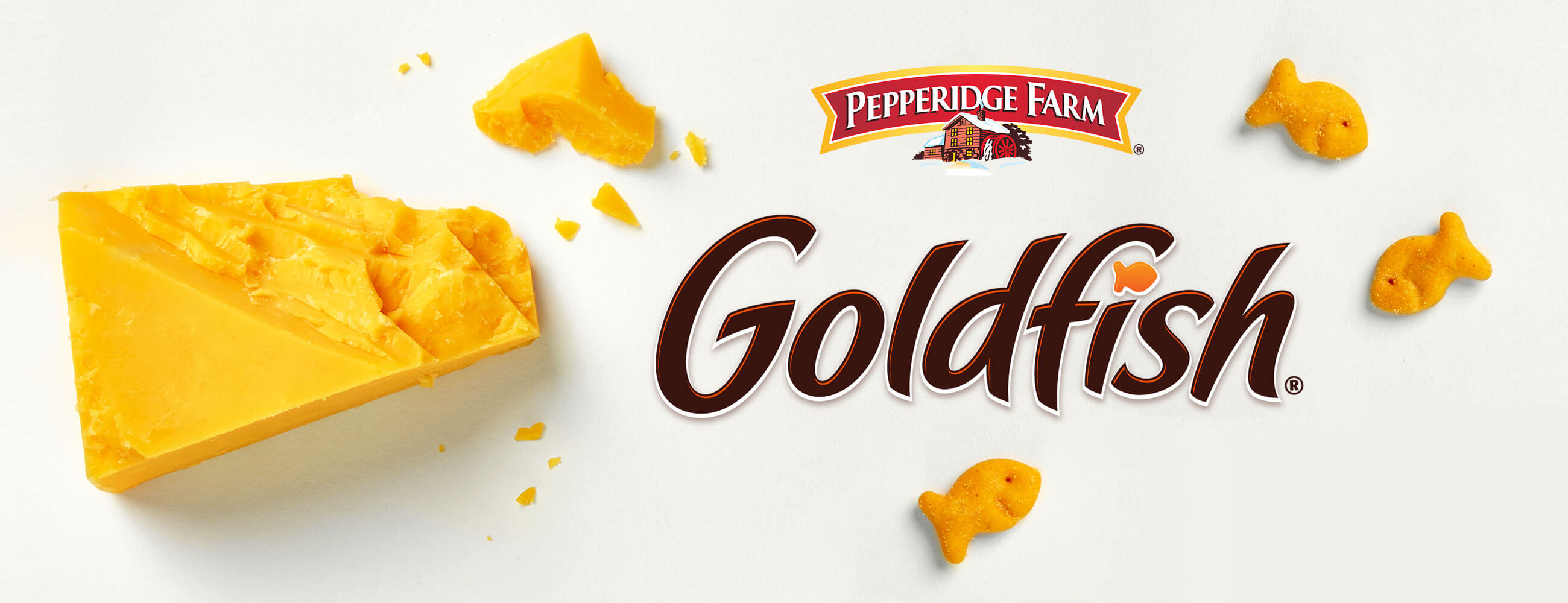 Pepperidge Farm Goldfish® logo with cheddar cheese block and Goldfish® crackers